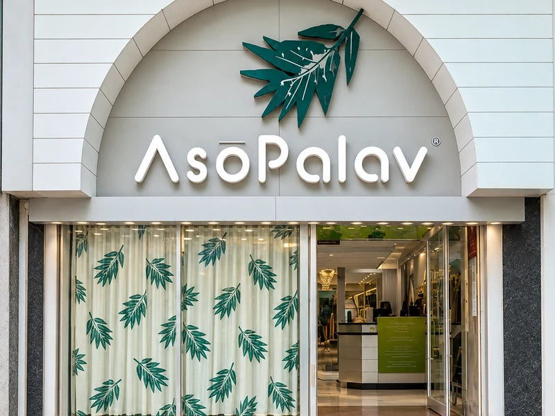 Asopalav Ratanpole storefront with its signature arch and leaf-pattern curtains